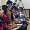 Estudiantes del Cuciénega asistentes a la charla, tomando notas.